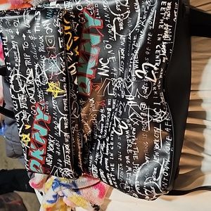 DKNY Tilly graffiti foldover backpack